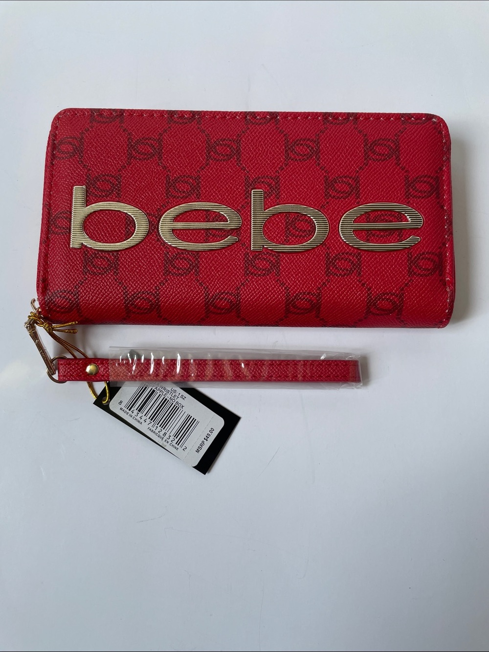 NWT bebe Wristlet with Red Trim and Gold Logo